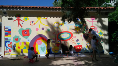 painting murals with children